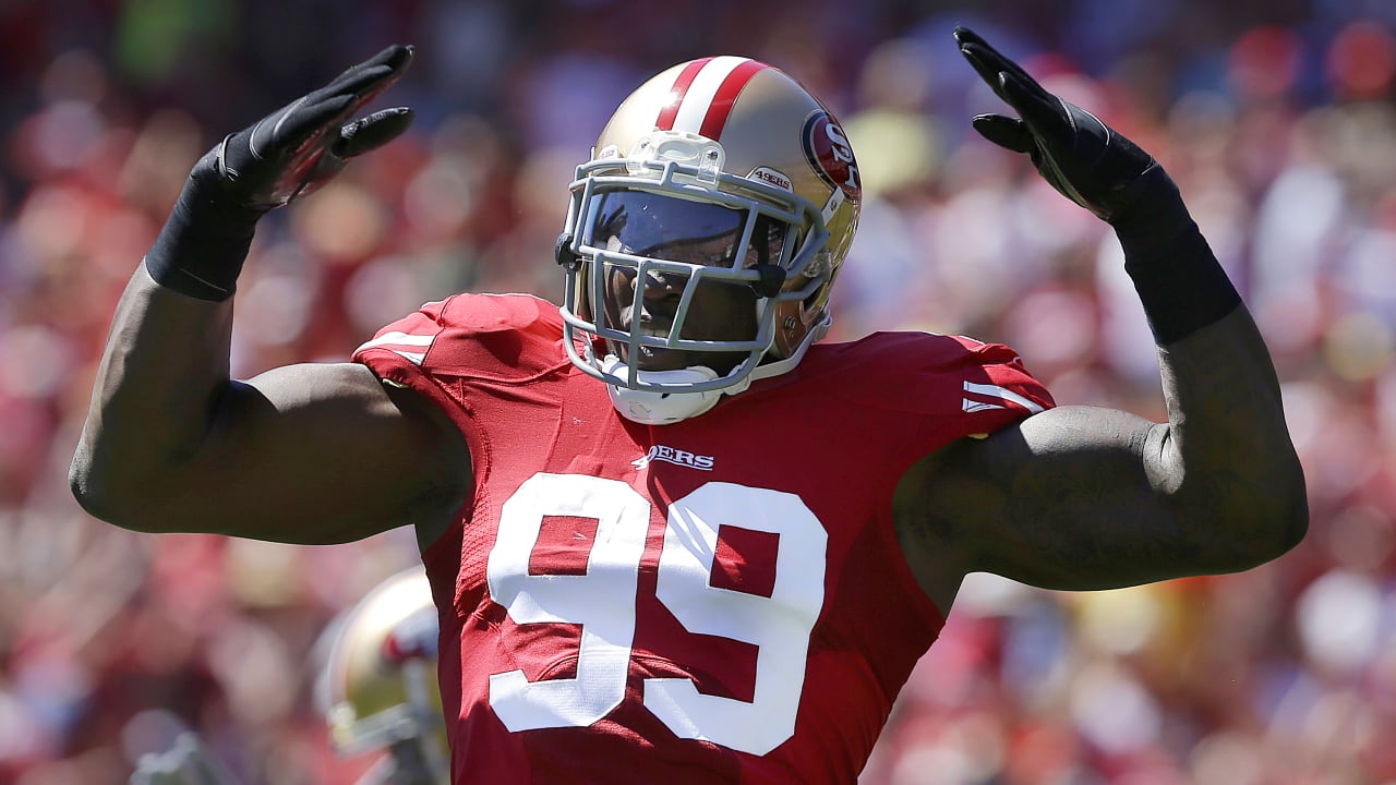 Aldon Smith playing in an NFL game during his professional football career