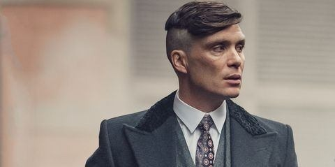Tommy Shelby hairstyle featuring a sharp undercut with textured hair on top inspired by the Peaky Blinders look