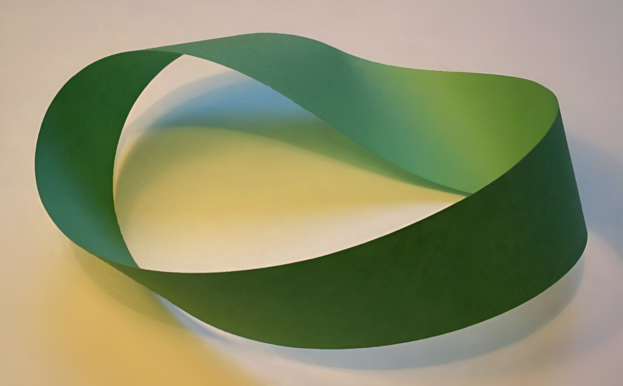 A Möbius strip made from a twisted paper loop demonstrating a one-sided mathematical surface