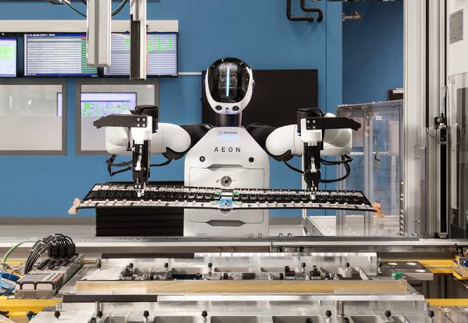 Industrial digital technology platform by Hexagon using AI, automation, sensors, and data analytics to improve manufacturing and infrastructure